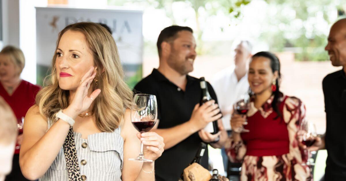 wine club members attending an exclusive wine tasting event at D'Aria