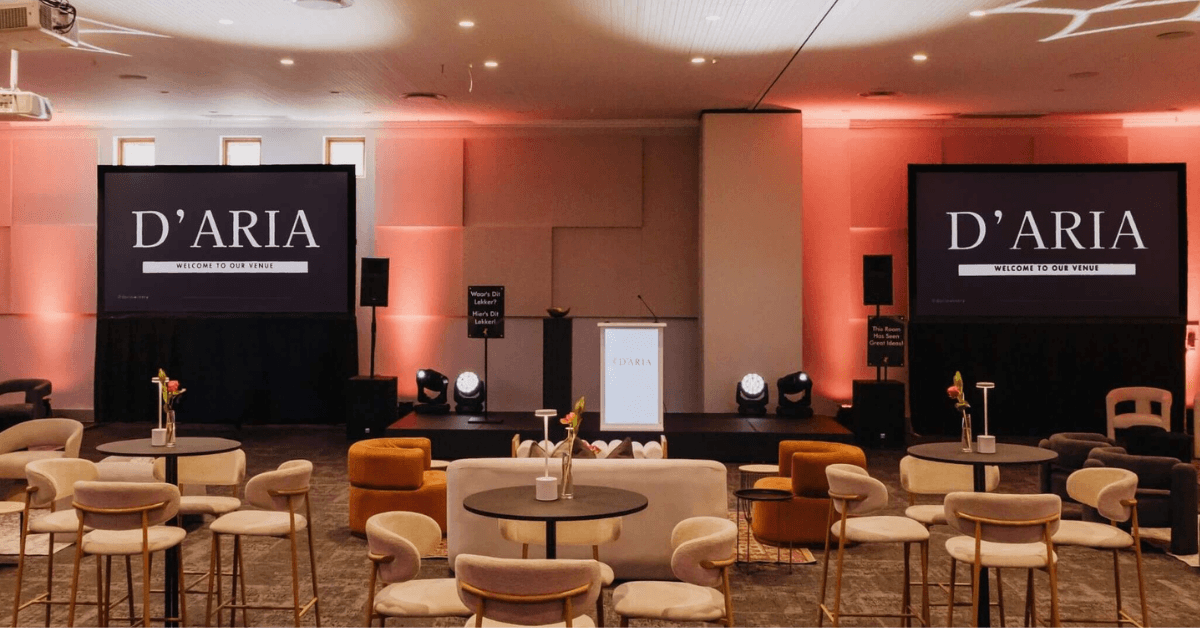 D'Aria Winery corporate event venue with presentation screens, seating and tables
